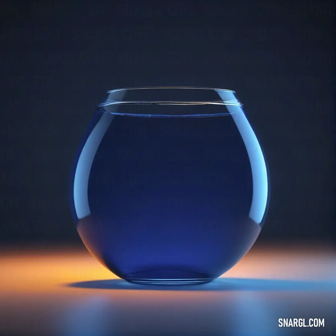 Blue glass filled with water on a table top with a black background. Example of Midnight blue color.