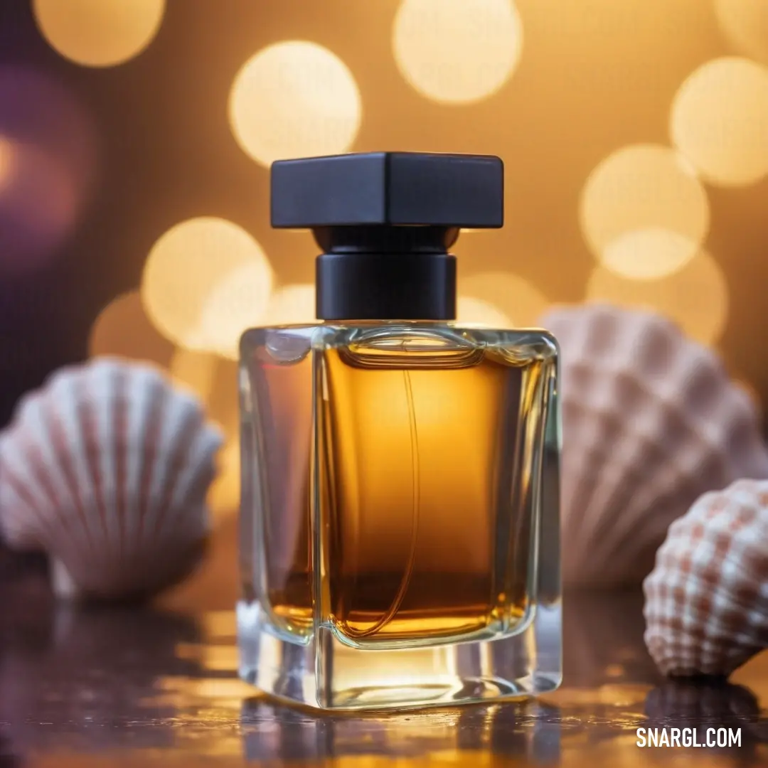 Bottle of perfume on top of a table next to shells and sea shells on a tablecloth. Example of Mikado yellow color.