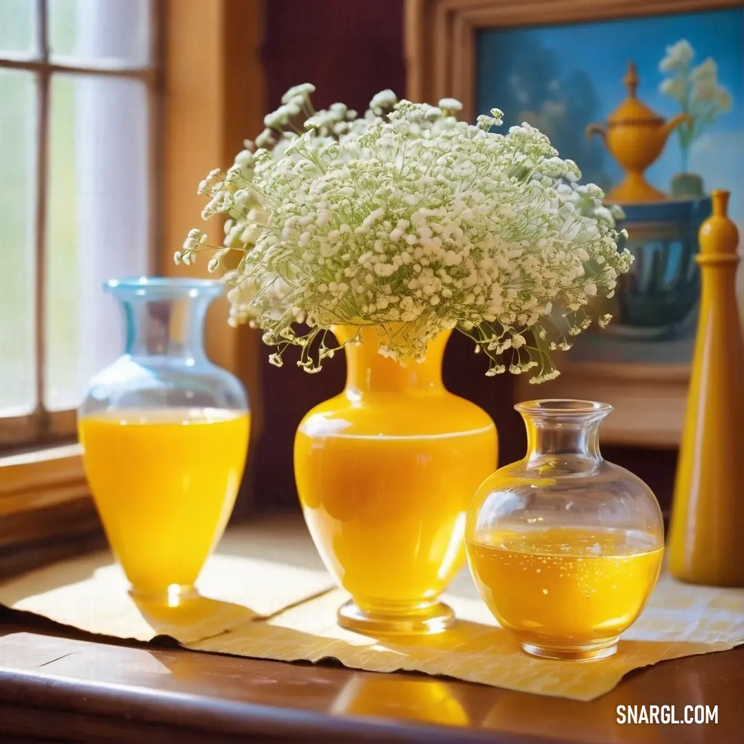 Vase with flowers in it on a table next to two vases. Color Mikado yellow.