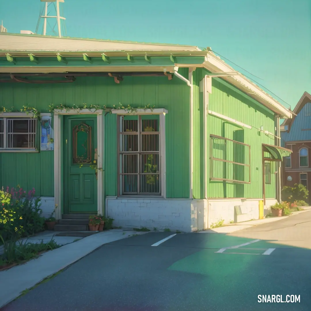 Green building with a cross on the top of it's roof