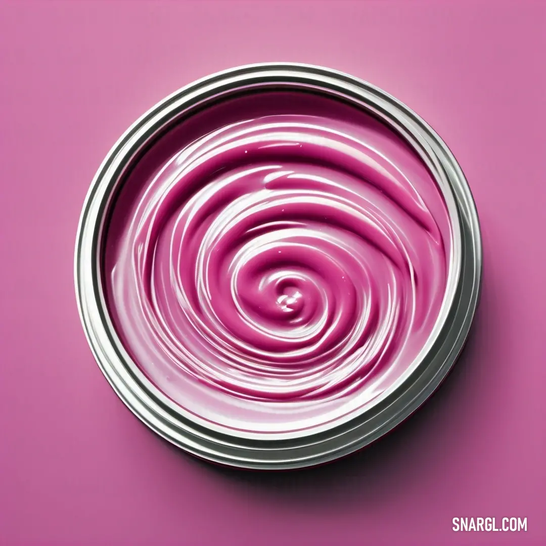 Pink tin with a swirl of paint on its side and a pink background. Color #C54B8C.