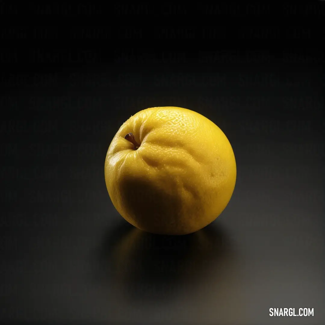 Lemon on a black surface with a black background. Example of #FFDB58 color.