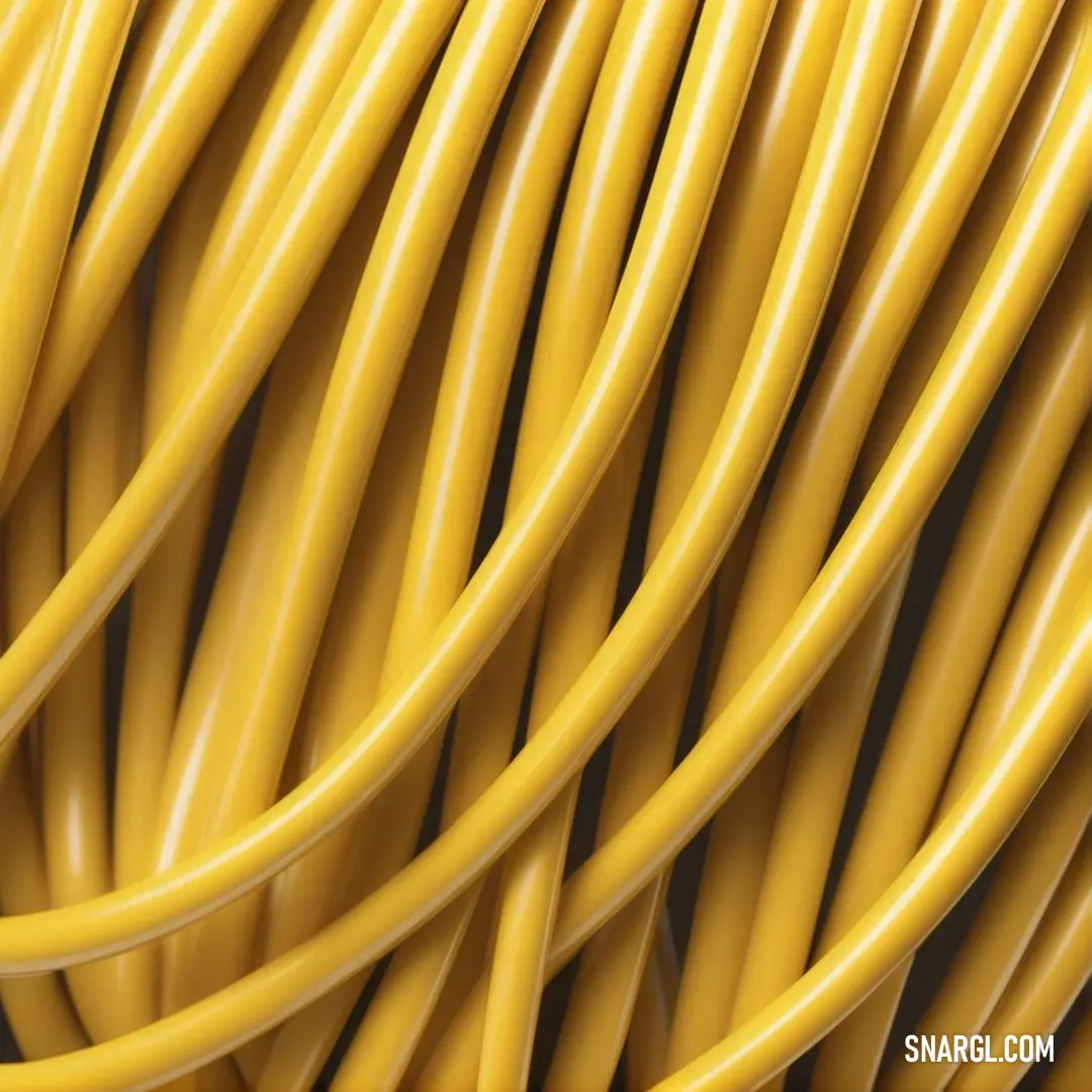 Mustard color. Close up of a yellow cable with a black background