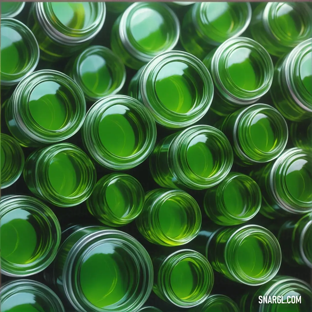 Napier green color. Close up of a bunch of green bottles with lids on them, all stacked together