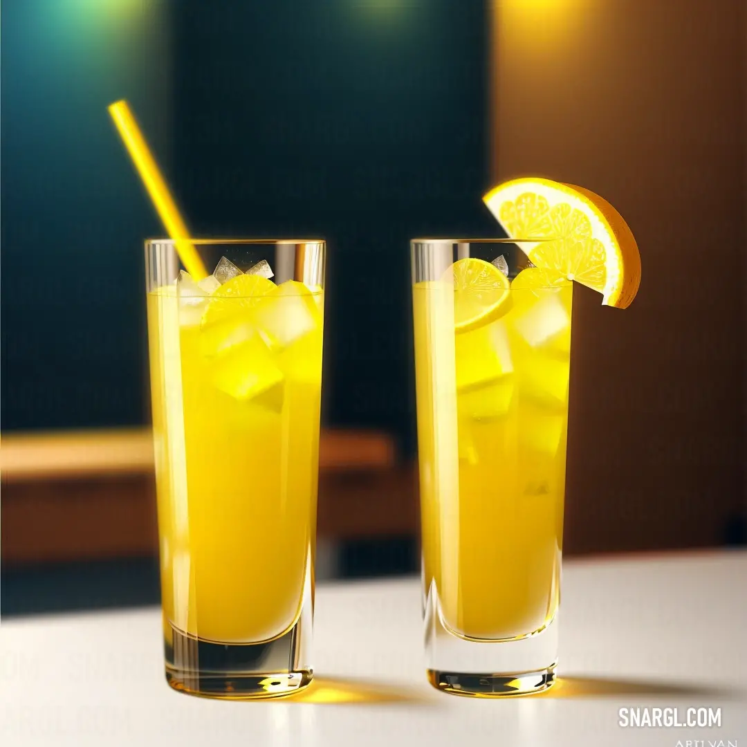 Two glasses of lemonade with a straw and a slice of lemon on the rim of the glasses are on a table