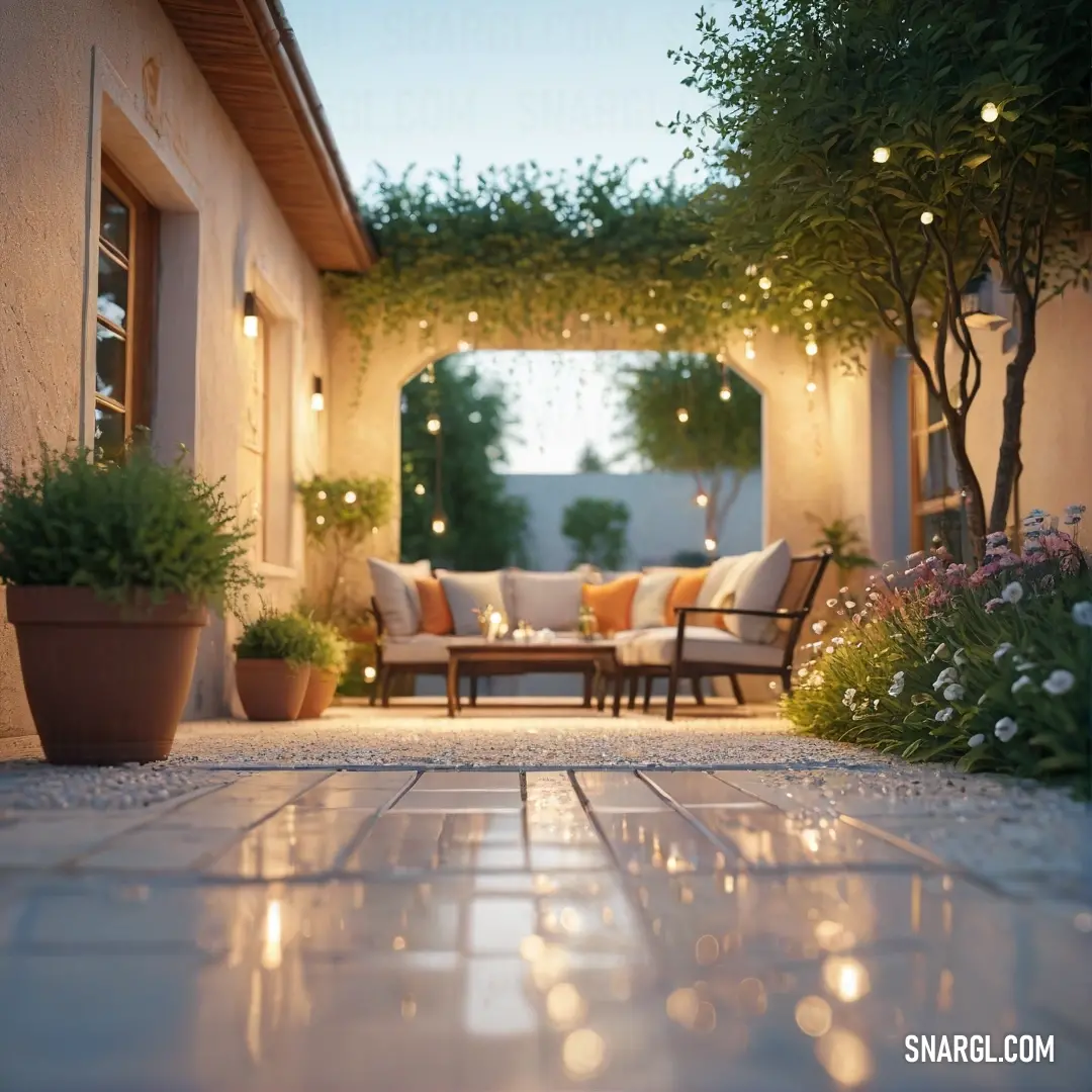 Patio with a table and chairs and lights on the ceiling and a couch and table with chairs. Example of Navajo white color.