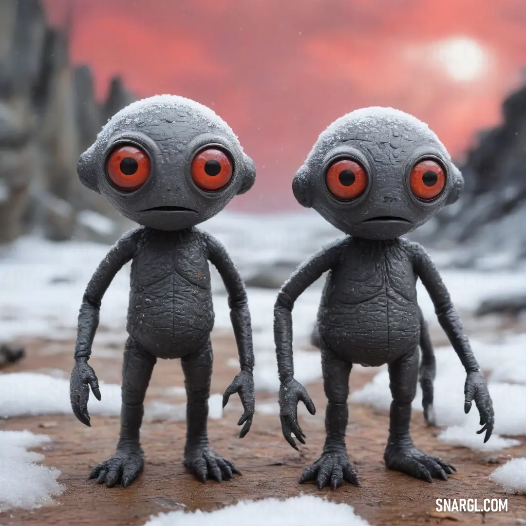 Two small gray alien dolls huddle together on a dirt road, their presence amidst the snow and ice resonates with a sense of wonder, hinting at the extraordinary in unexpected places.