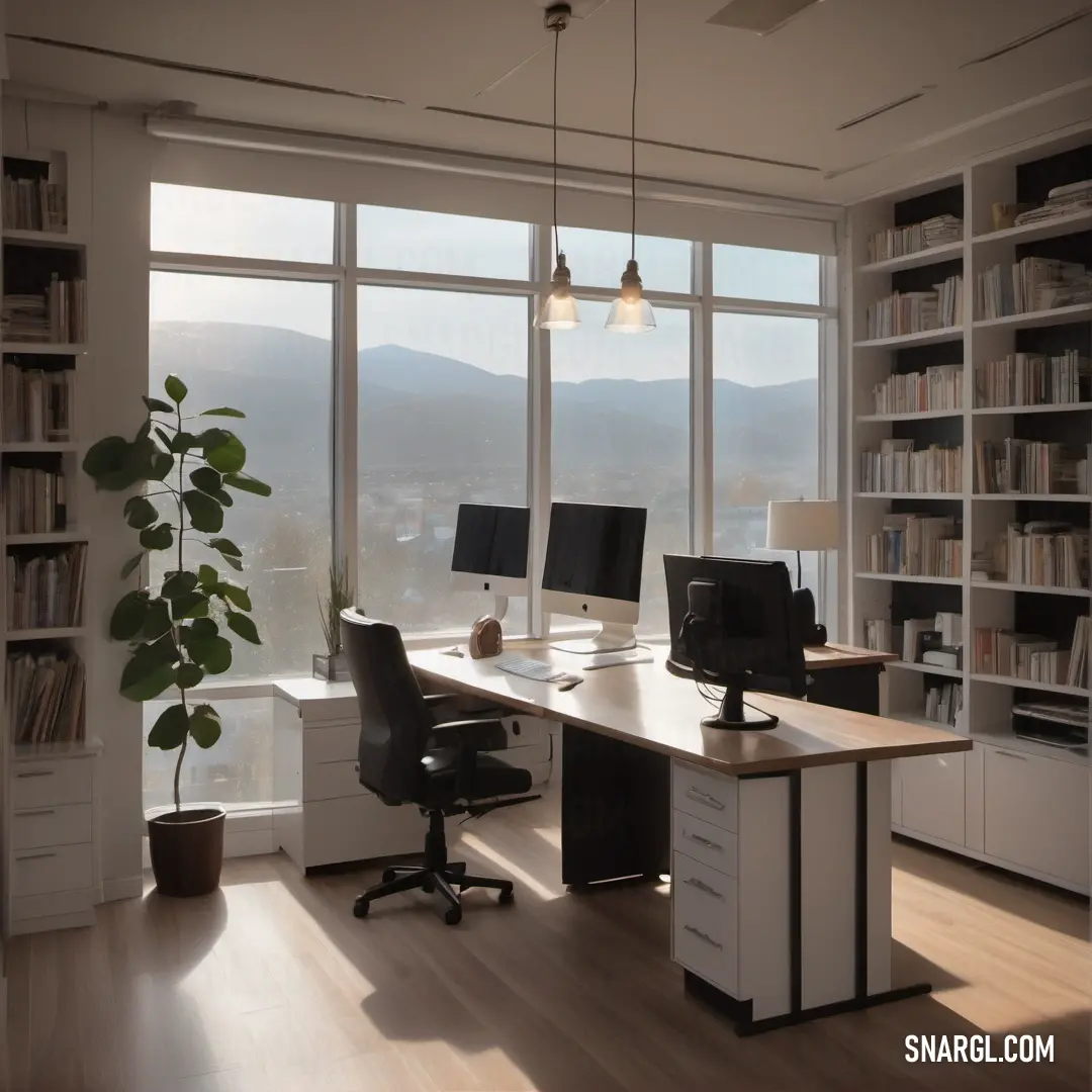 Desk with two monitors and a keyboard in a room with a large window and a view of the mountains. Color RGB 255,243,239.