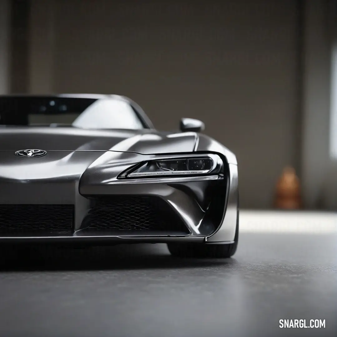 A charming close-up of a detailed car model resting on a table, illuminated by natural light streaming through the window, creating a serene atmosphere.