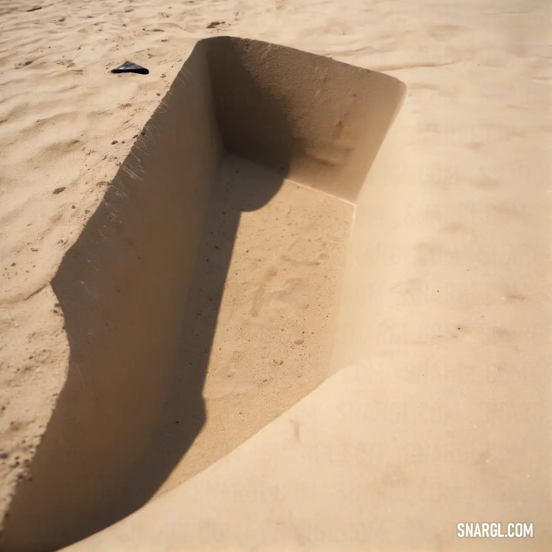 A serene beach scene featuring a rustic bench nestled in soft sand, close to gently lapping waves, with a bottle resting on the ground, capturing a moment of relaxation and tranquility.