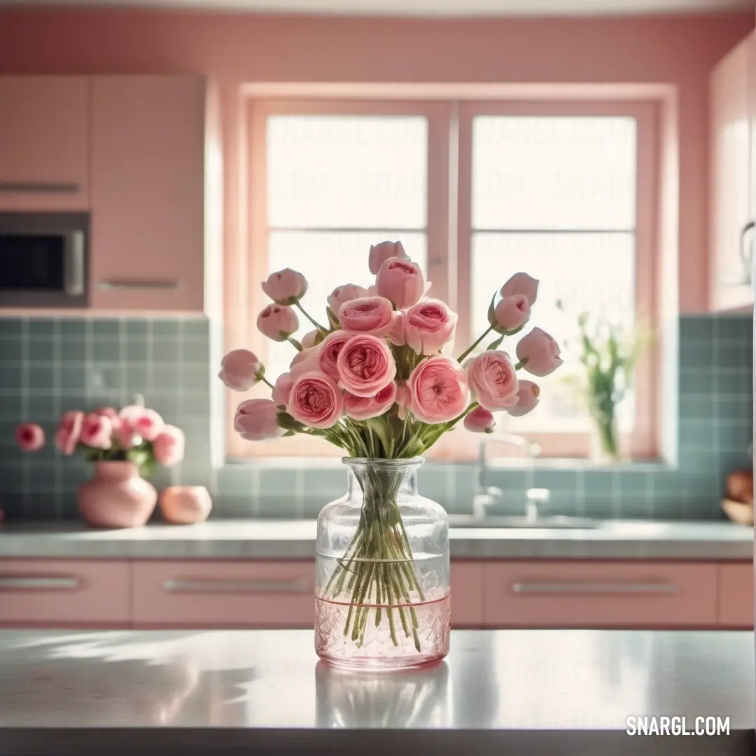 Vase filled with pink roses on a kitchen counter top next to a window with a pink tile back splash. Example of CMYK 0,25,27,0 color.
