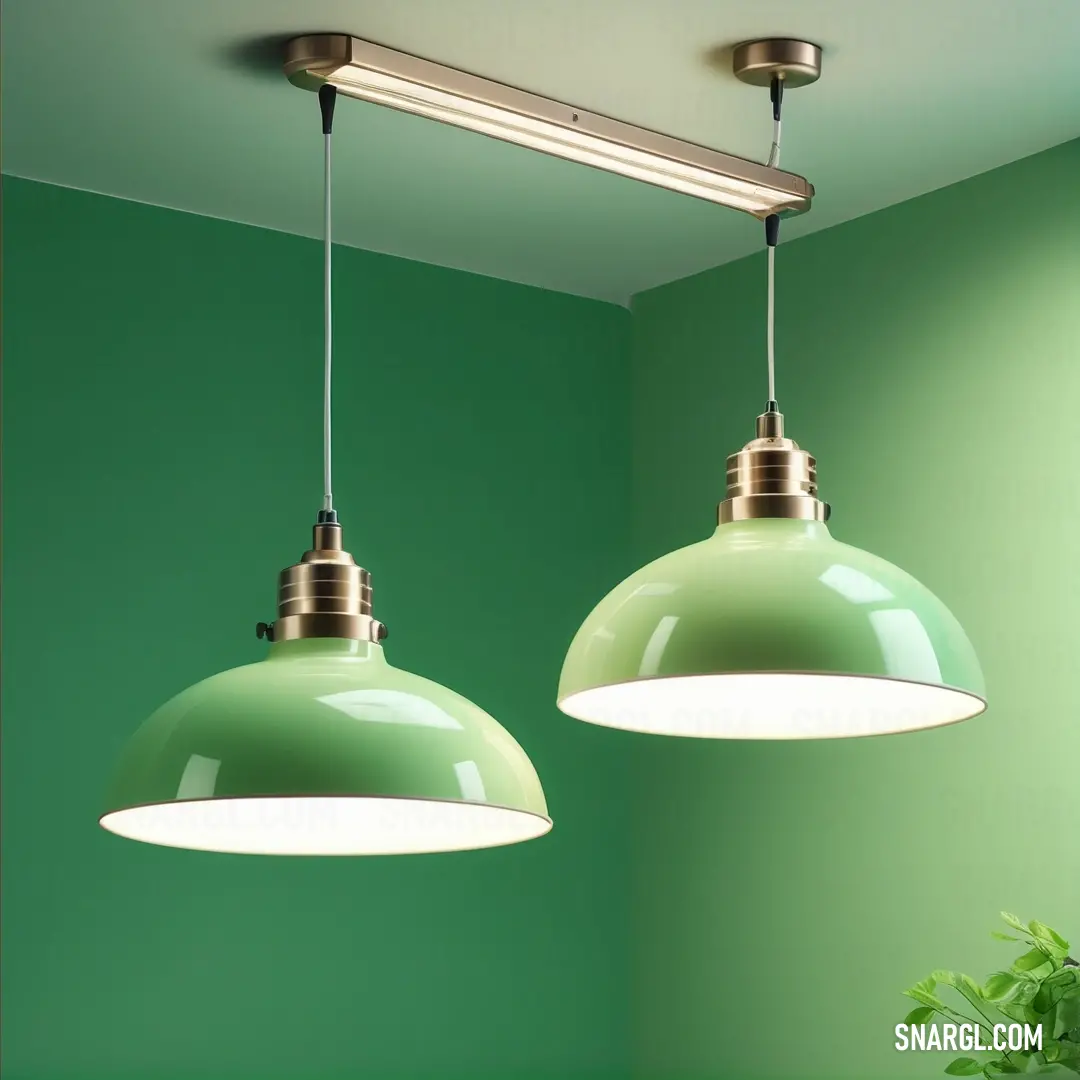 Two green lights hanging from a ceiling in a room with green walls and a plant in the corner of the room. Color NCS S 0550-G10Y.