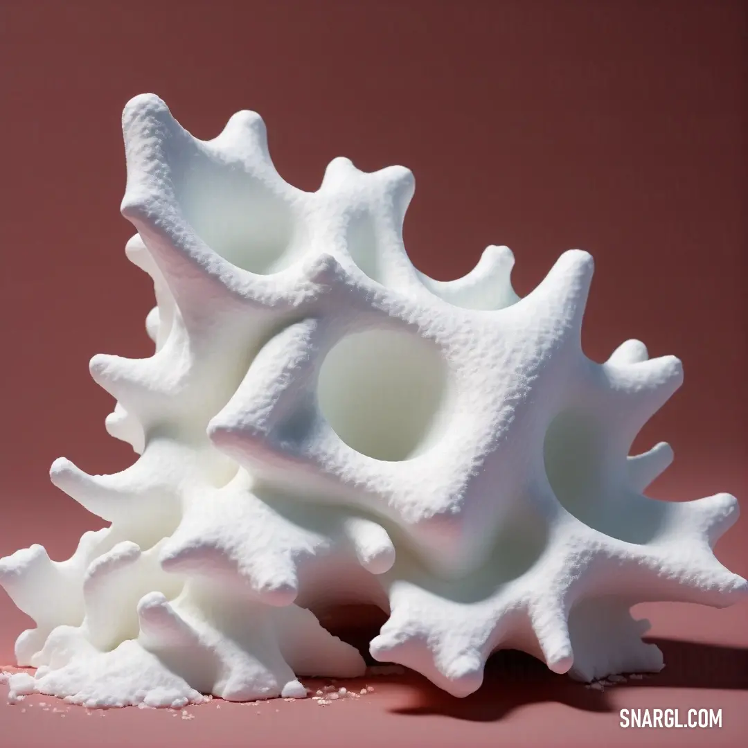 NCS S 0804-R70B color. White sculpture of a coral on a pink background