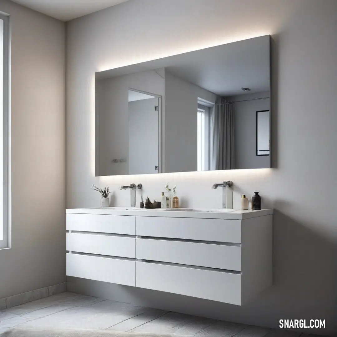 A spacious bathroom features a large mirror above dual sinks, elegantly designed to accommodate two. The soft, ambient light invites you to imagine a tranquil space where daily routines transform into moments of serenity and effortless elegance.