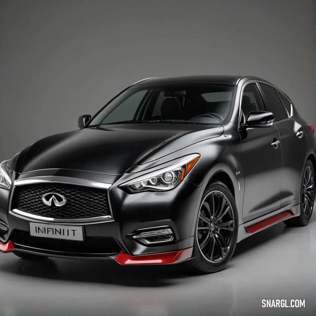 A bold black Infiniti captivates the viewer in a well-lit studio, showcasing its refined design against a soft gray backdrop that enhances its luxurious appeal.