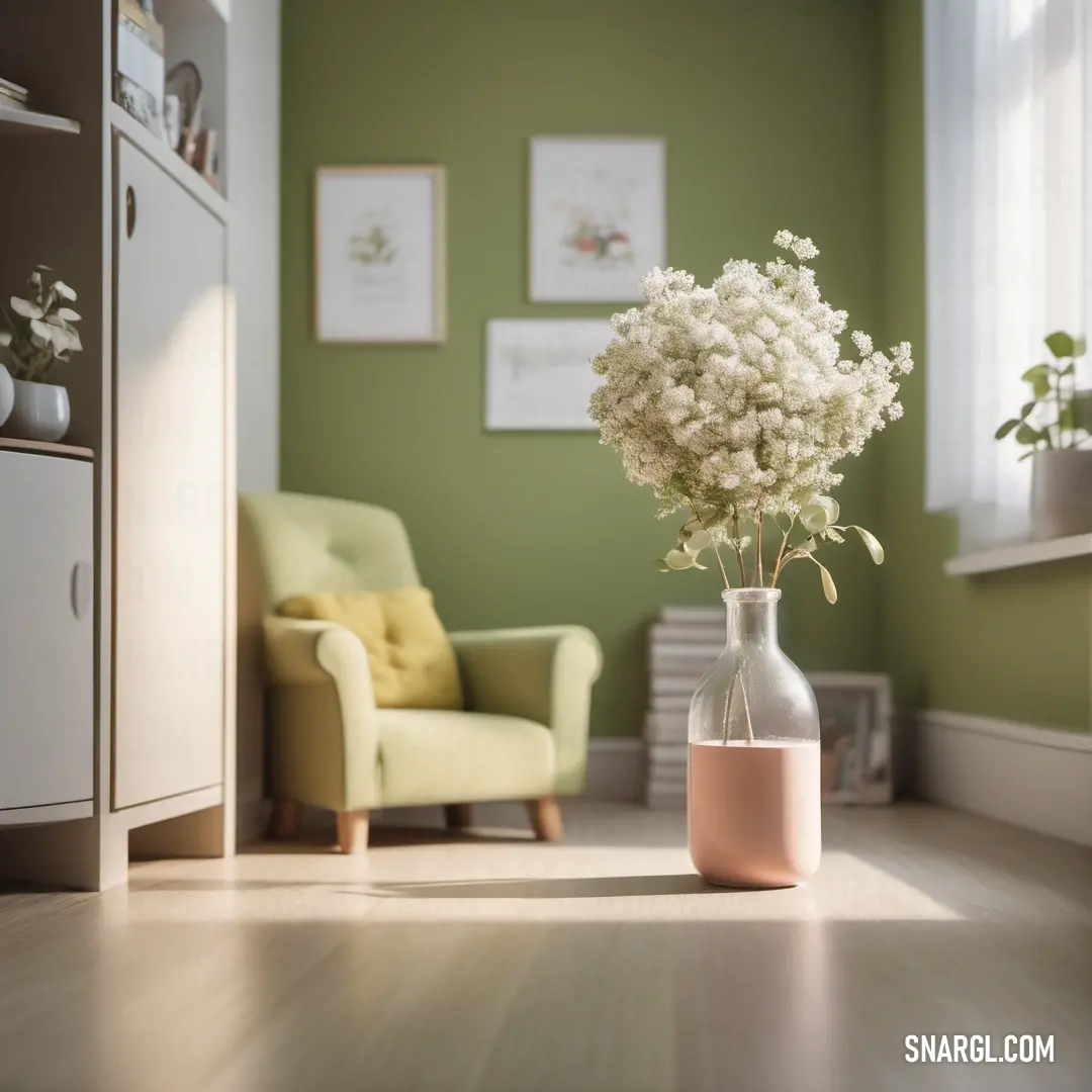 Vase with flowers in it on a wooden floor in a room with green walls and a yellow chair. Color CMYK 0,15,15,2.