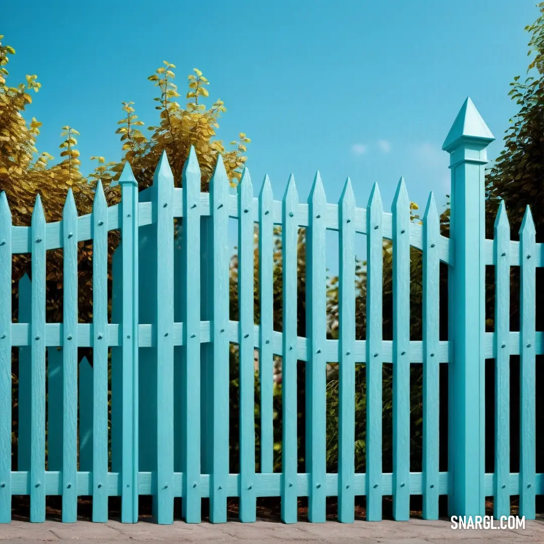 Blue picket fence with a blue sky in the background. Color NCS S 1050-B.