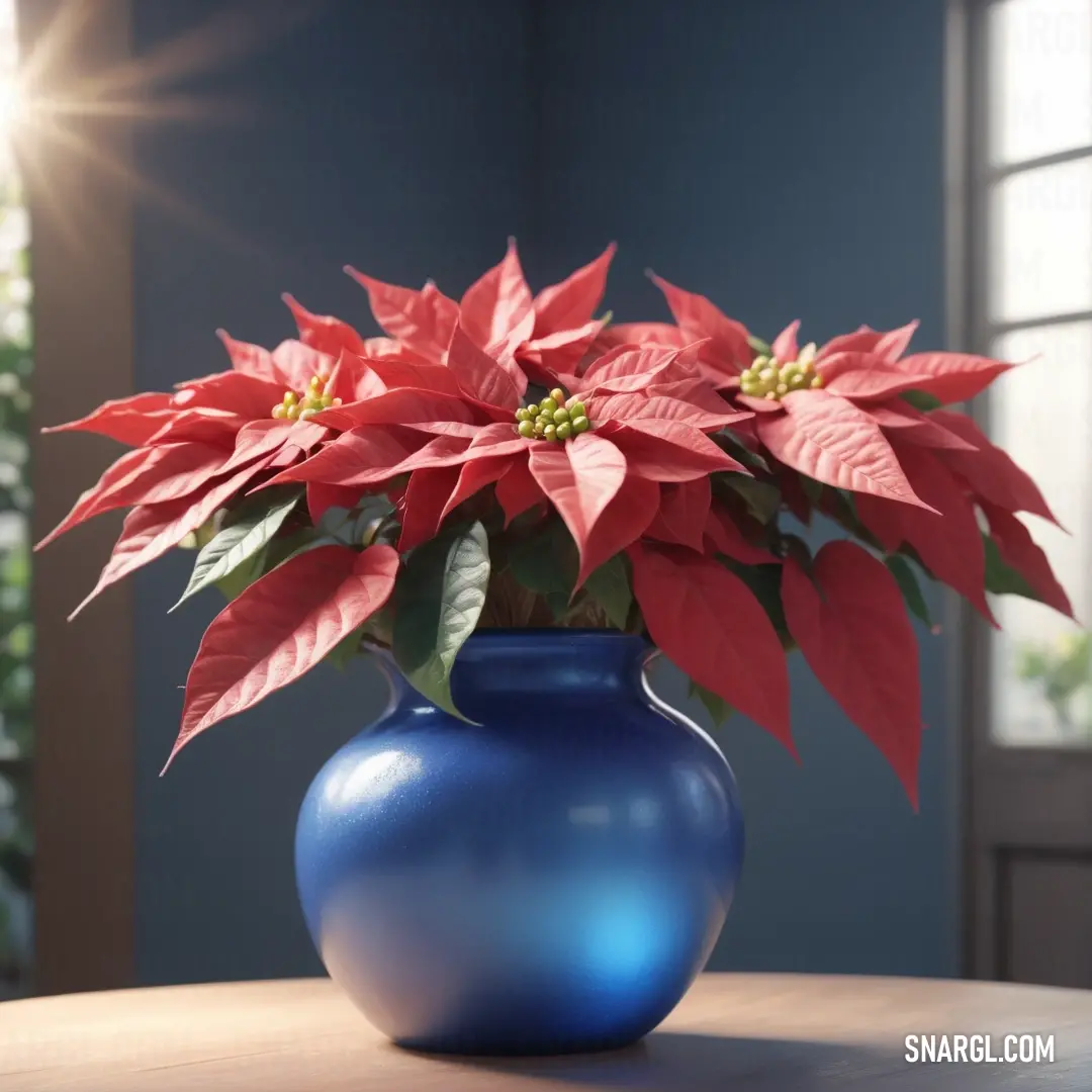 A beautiful blue vase filled with vibrant red flowers sits elegantly on a table, illuminated by the natural light streaming through a nearby window, creating a striking contrast against the blue wall.