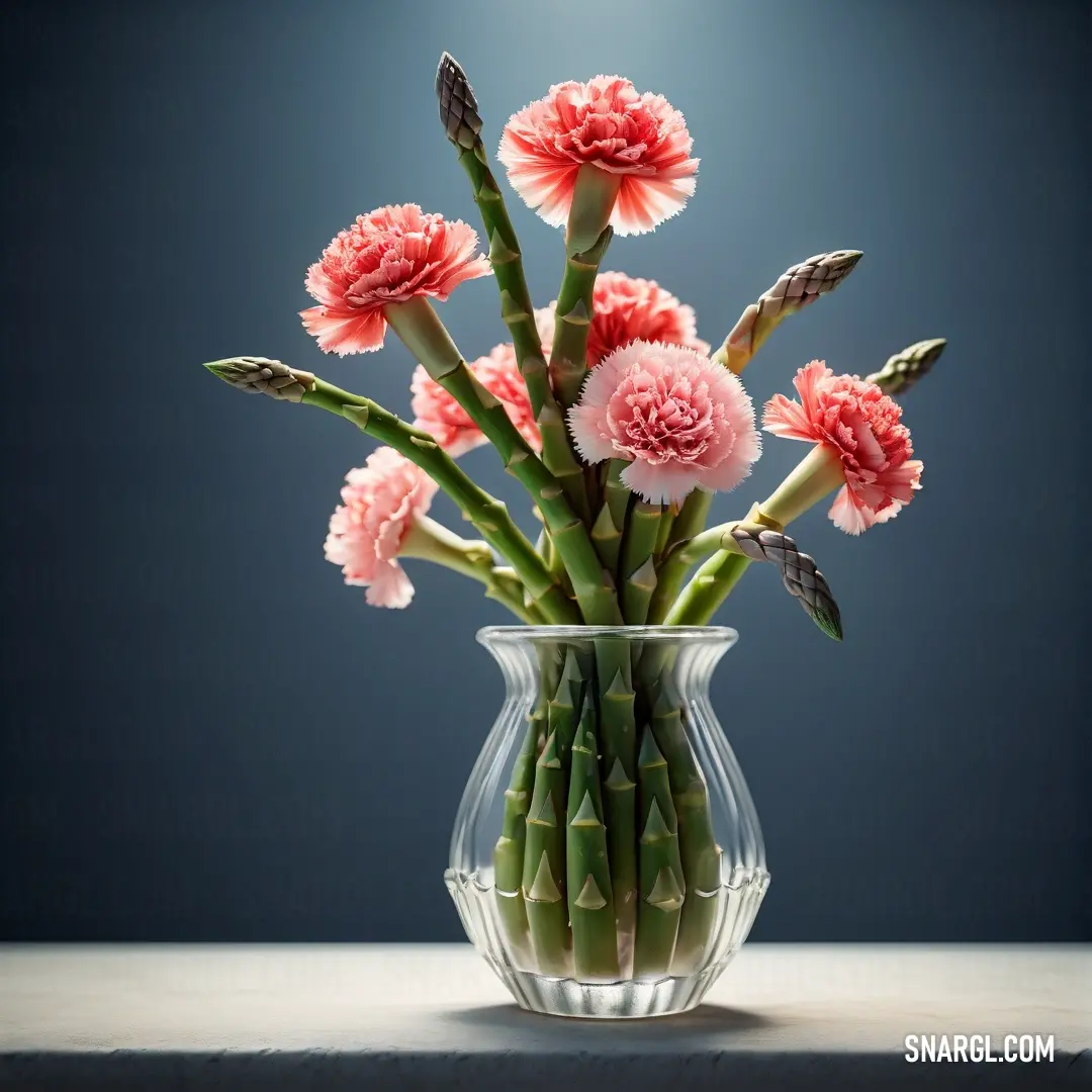 A stunning vase filled with vibrant pink flowers sits gracefully on a table adjacent to a dreamy blue wall. The colorful arrangement brings warmth and cheerfulness, enhancing the room's inviting ambiance.