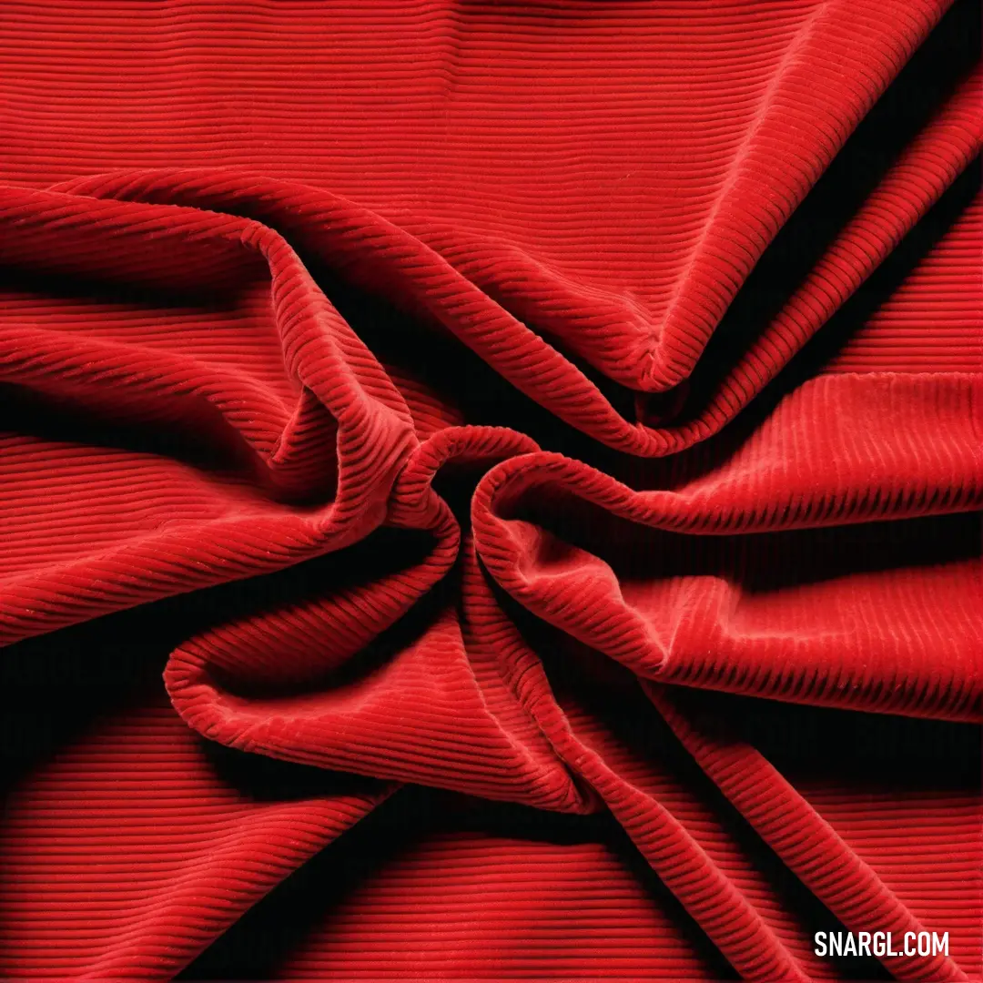 Red fabric with a very large knot on it's end and a very thin knot on the end. Color #BF002A.