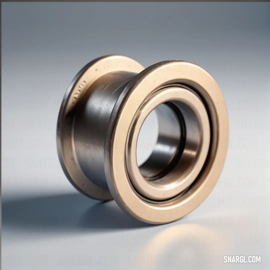 An elegant ball bearing resting on a reflective white surface, capturing the nuances of light and shadow, revealing the intricate design of the bearing unit.