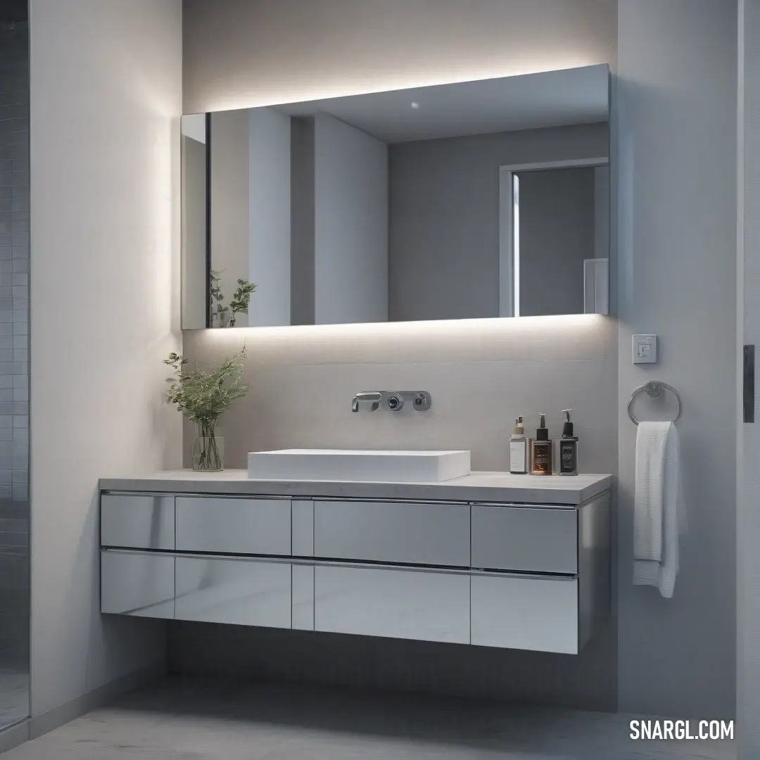 An inviting bathroom scene featuring a sleek sink and a stylish mirror reflects the soft illumination of the space. A lush plant thrives in the corner, adding a touch of nature and freshness to this serene, modern atmosphere.