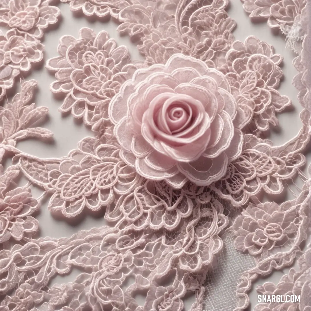 Pink rose on a white lace fabric with a flower on it's center piece. Color NCS S 1510-R.