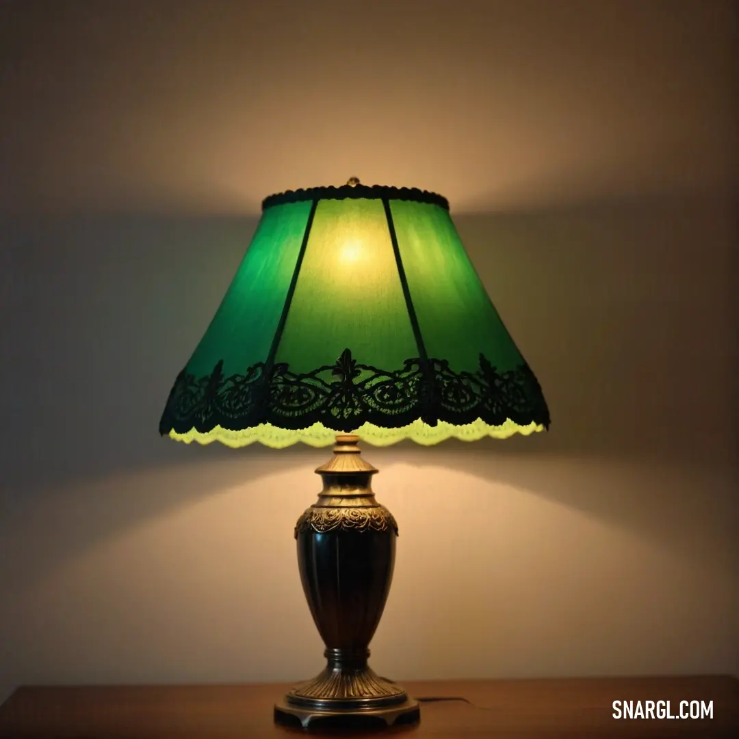 A delicate lamp featuring a soothing green shade casts a warm glow in a stylish interior setting, enhancing the calm and inviting ambiance of the room where modern design meets a cozy atmosphere.