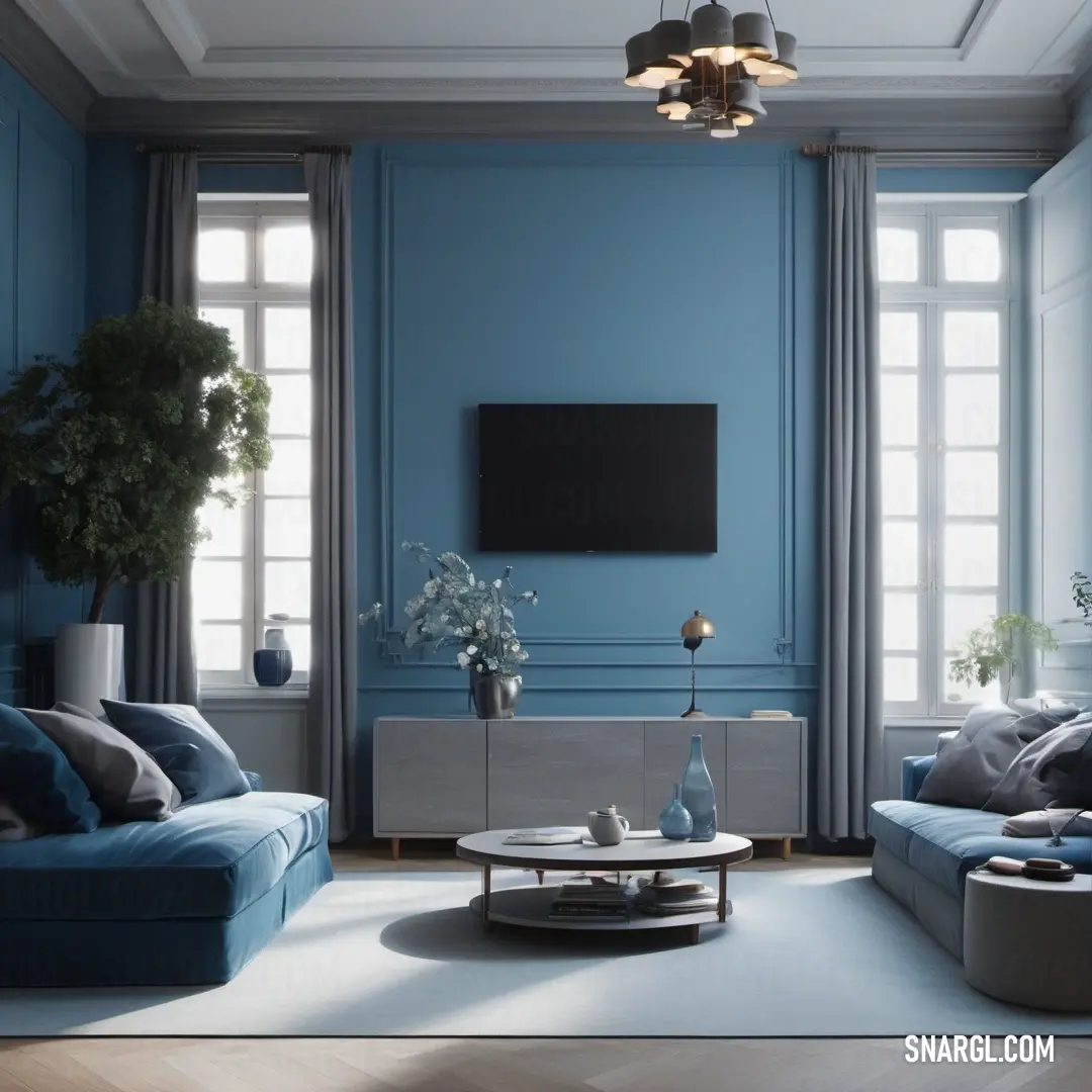 Living room with blue walls and a tv on the wall and a couch and a table in front of it. Example of NCS S 3020-B color.