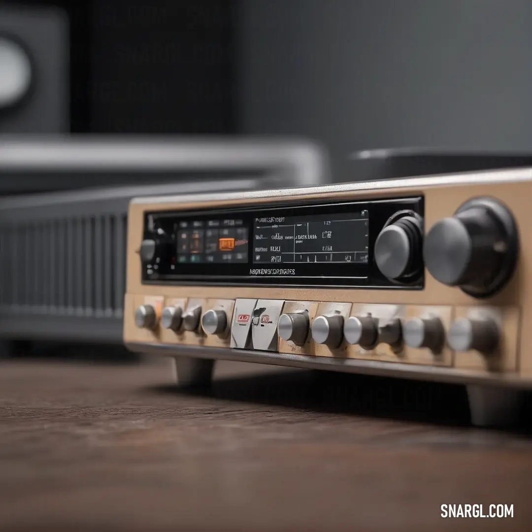 A classic radio rests gracefully atop a polished wooden table beside a dynamic speaker system, inviting nostalgia and sound entertainment in a cozy corner of a stylish room.