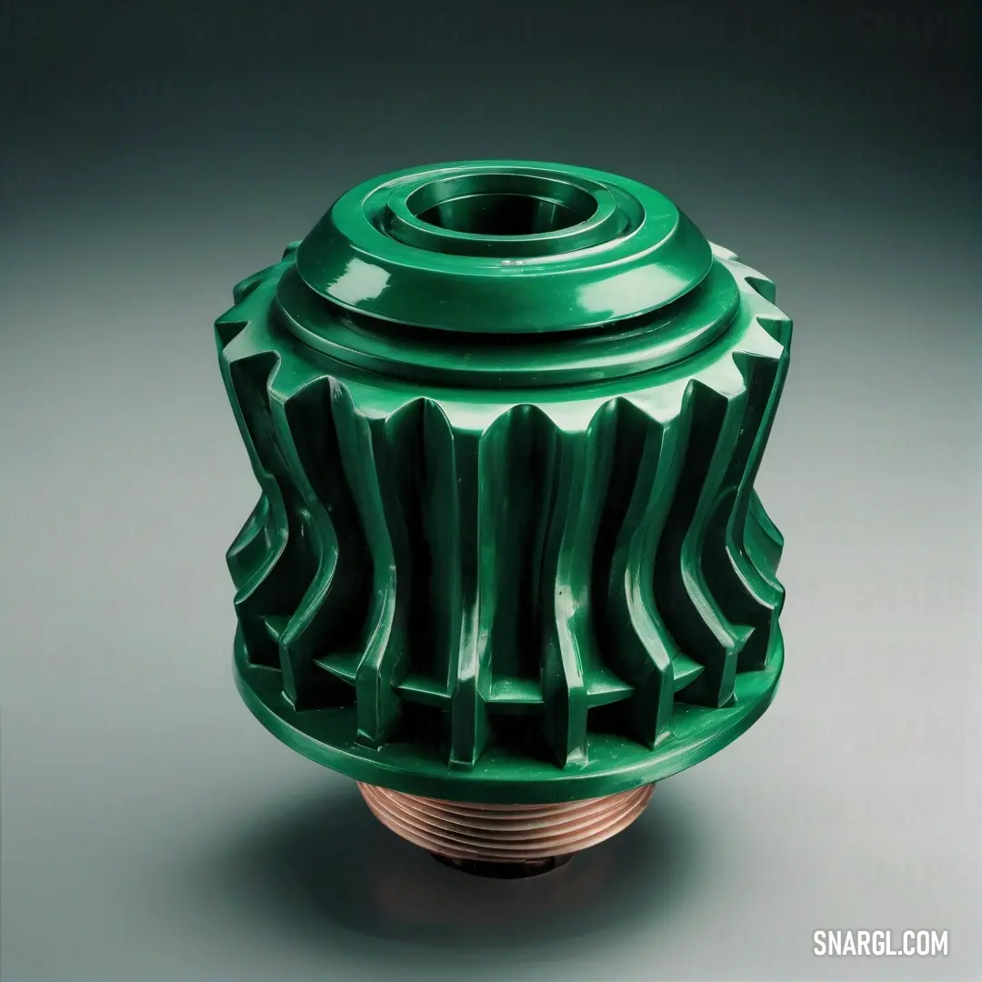 Green vase with a metal base on a gray background. Color #00935E.