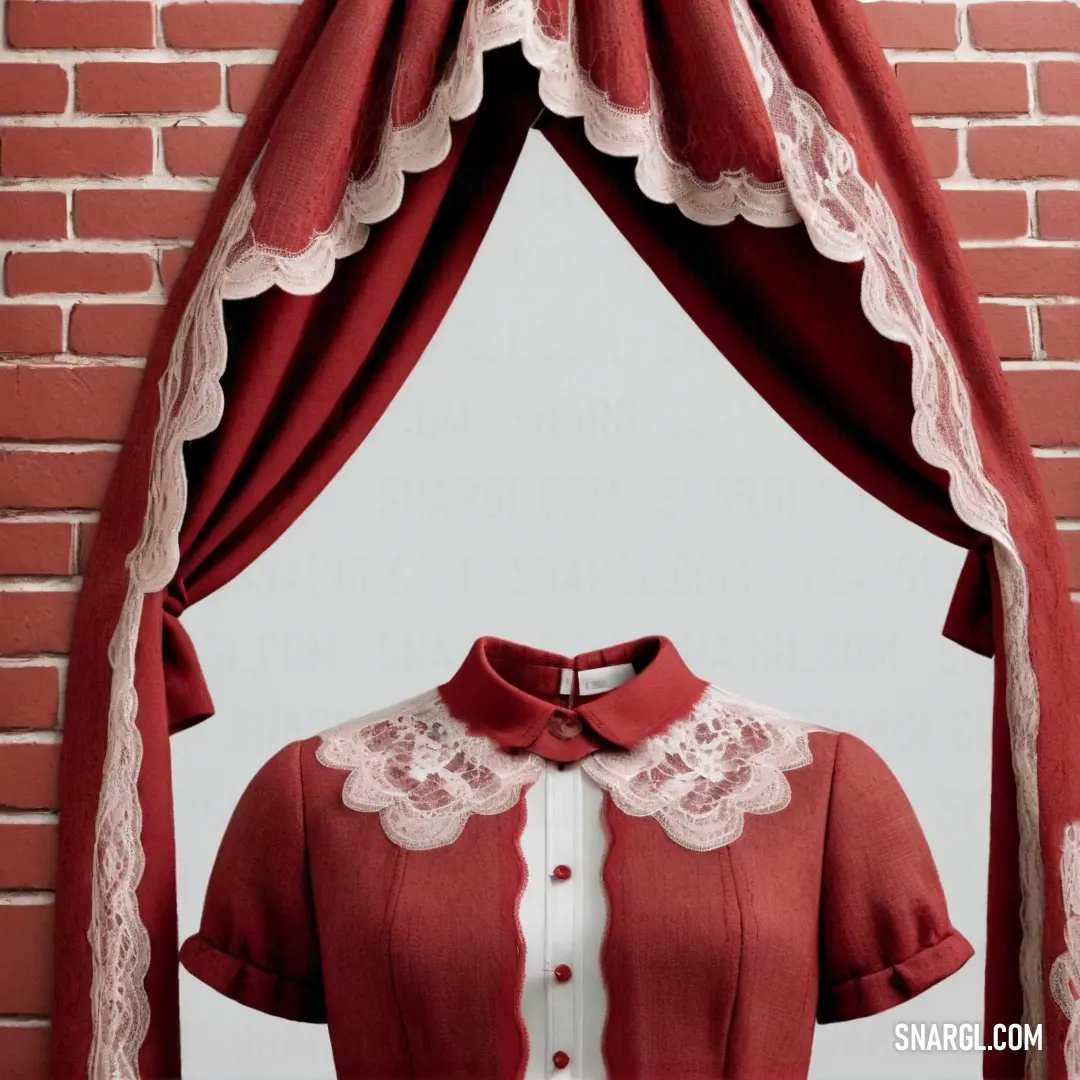 Red shirt with white lace on the collar and sleeves is hanging on a brick wall with a red curtain. Example of CMYK 0,80,60,25 color.