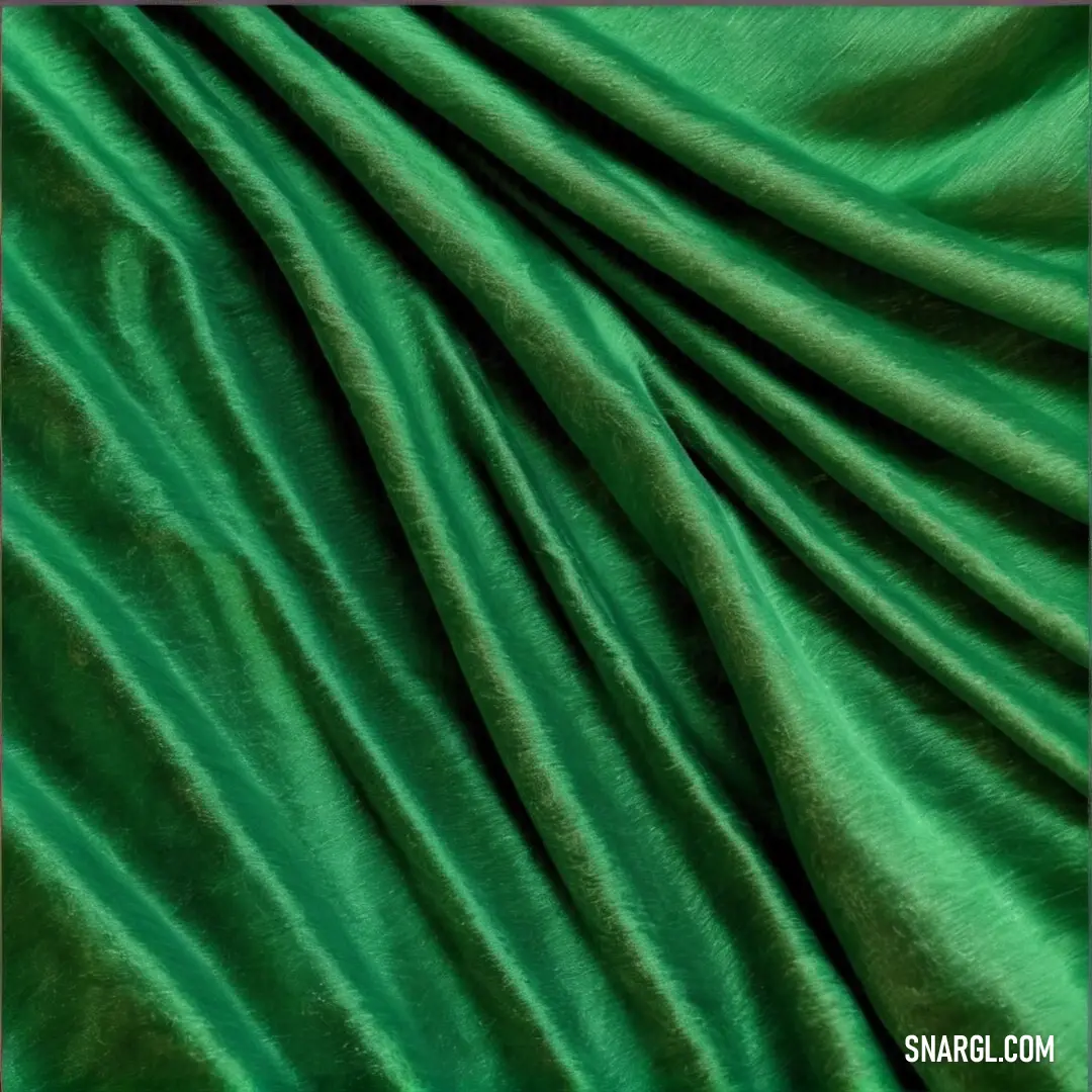 Green fabric with a very thin pattern on it's surface, with a slight. Color #008240.