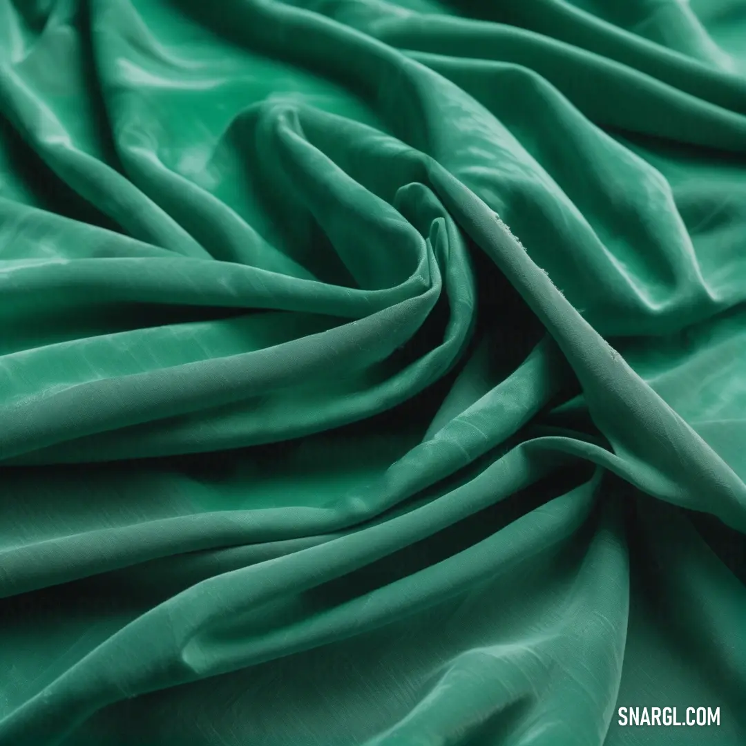 Green fabric with a very thin line of fabric on it's side. Color #007558.