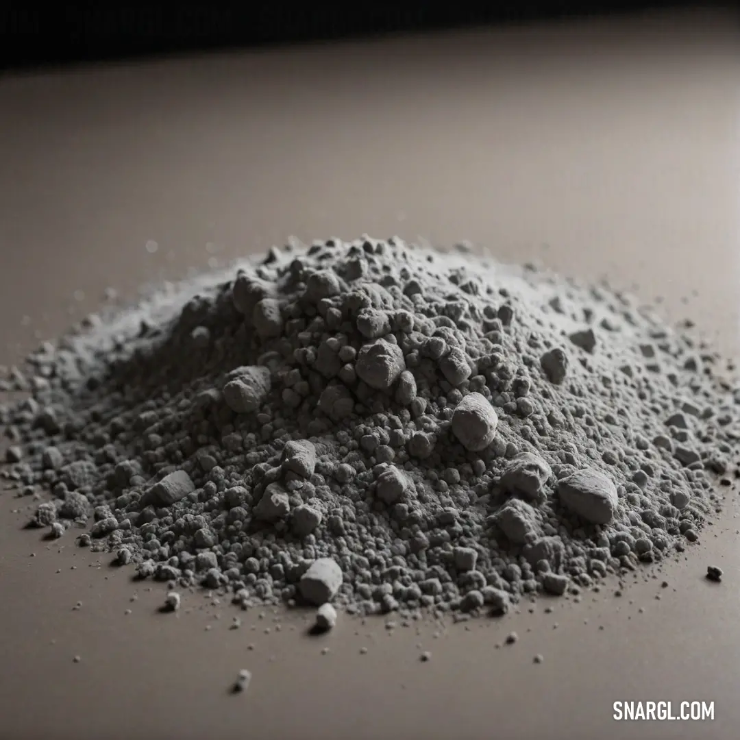 A scattered pile of powdered food sits on a rustic table, next to a gleaming knife. The soft light casts delicate shadows on the surface, adding a sense of simplicity and stillness to this seemingly mundane yet intriguing scene.