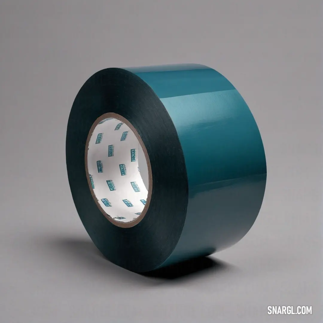 A roll of tape lies on a soft grey background, its white dot catching the light, symbolizing creativity and craft, inviting viewers to imagine the numerous projects it could be a part of.