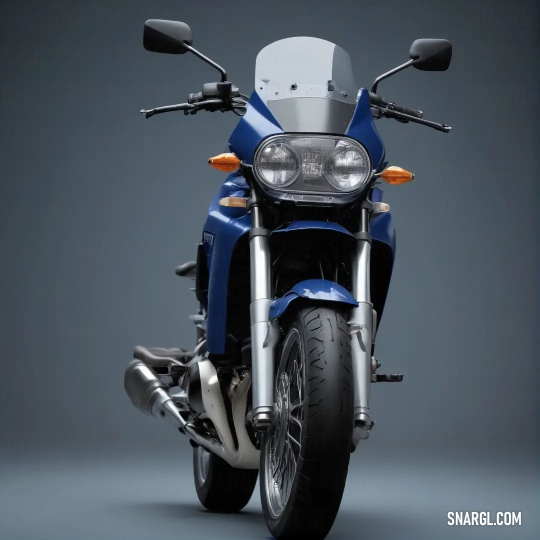 Blue motorcycle is shown with a gray background. Color #385B94.