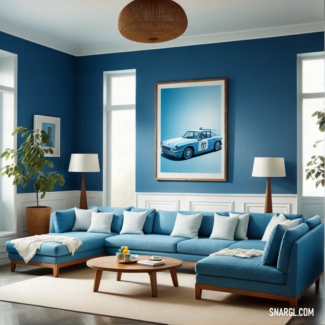 Living room with blue walls and a blue couch and a coffee table with a plant in it. Color CMYK 100,10,0,58.