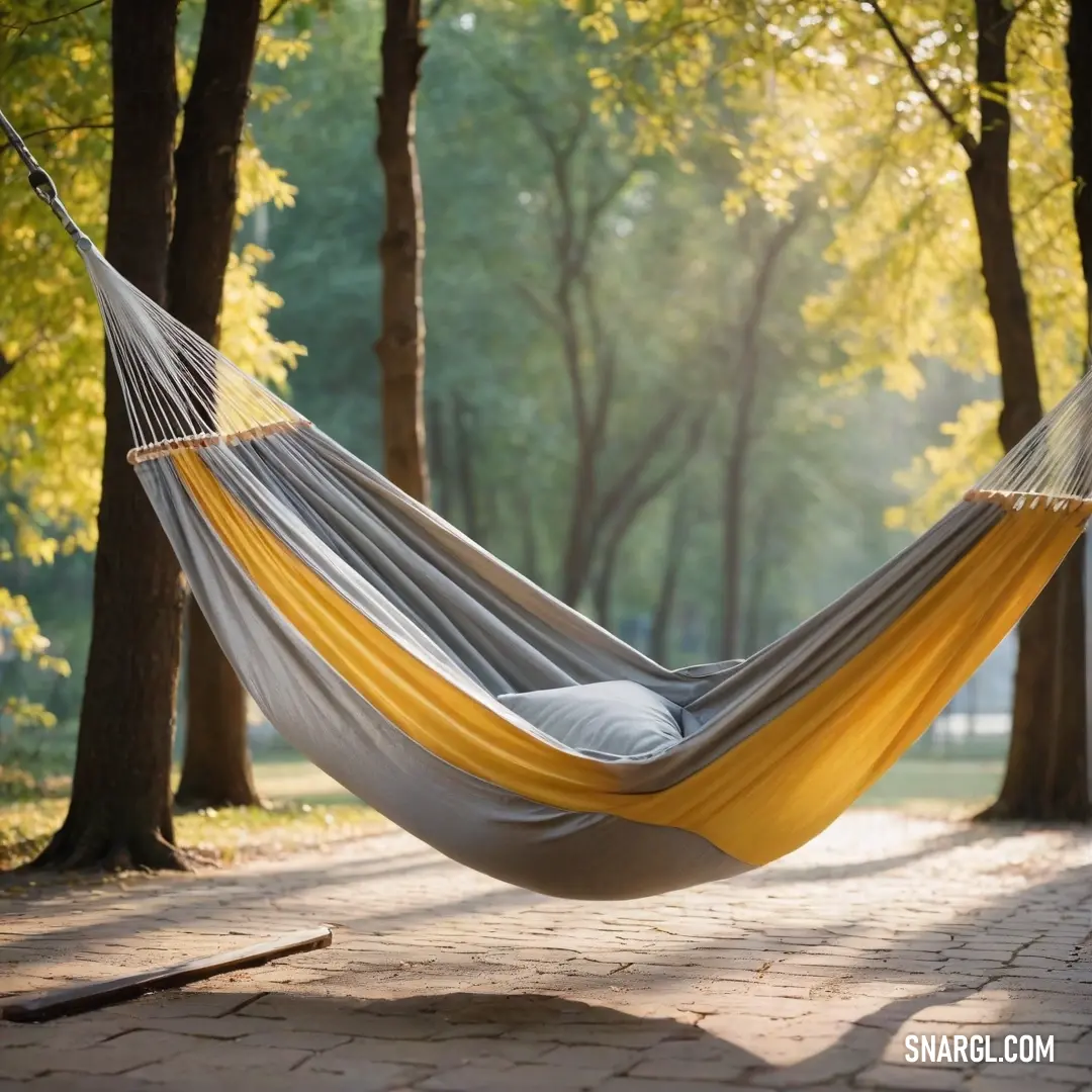 A serene hammock sways gently between verdant trees in a peaceful park setting, under a soft canopy of leaves, evoking a sense of relaxation and harmony with nature while embracing the CMYK color palette of nature.