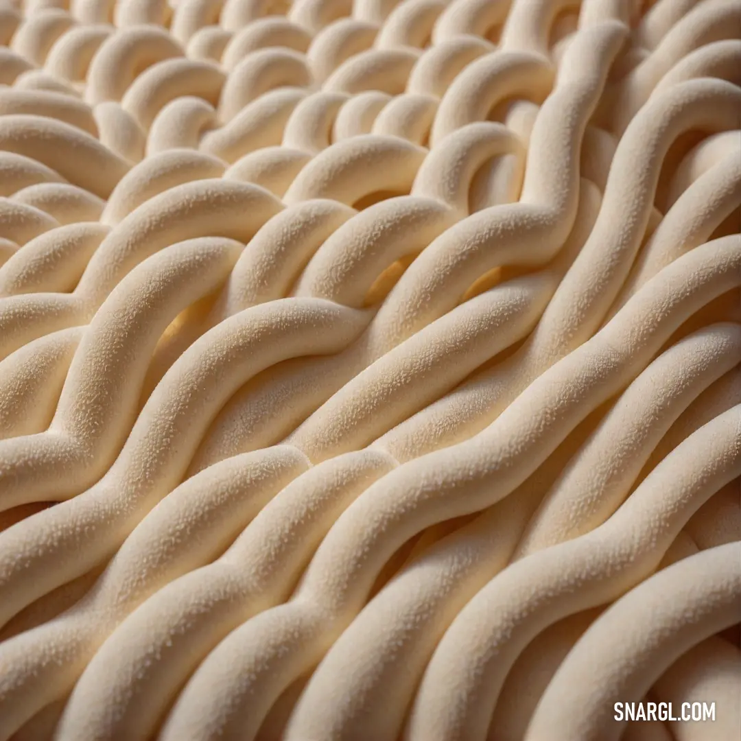 A stunning close-up of a textured surface, featuring intricate wavy lines and curves in warm beige tones, perfectly contrasted against an inky black background that adds depth and elegance.