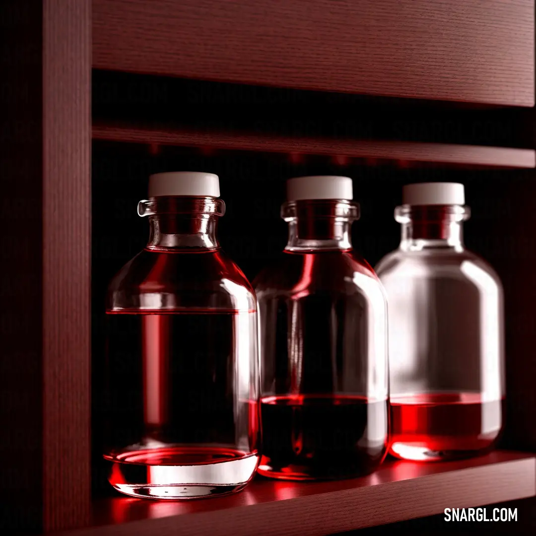 NCS S 4550-Y90R color. Three bottles of liquid are on a shelf in a dark room with a red light coming from the top