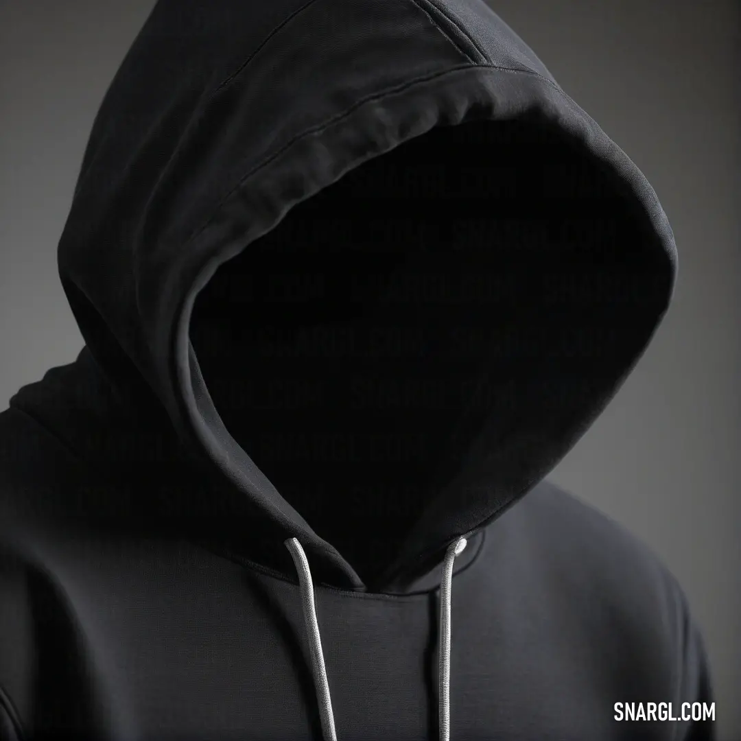 A striking black hooded sweatshirt layered over a crisp white hoodie, all against a dark background that enhances the ensemble. This combination creates a stylish and modern look, perfect for any casual outing or comfort wear.