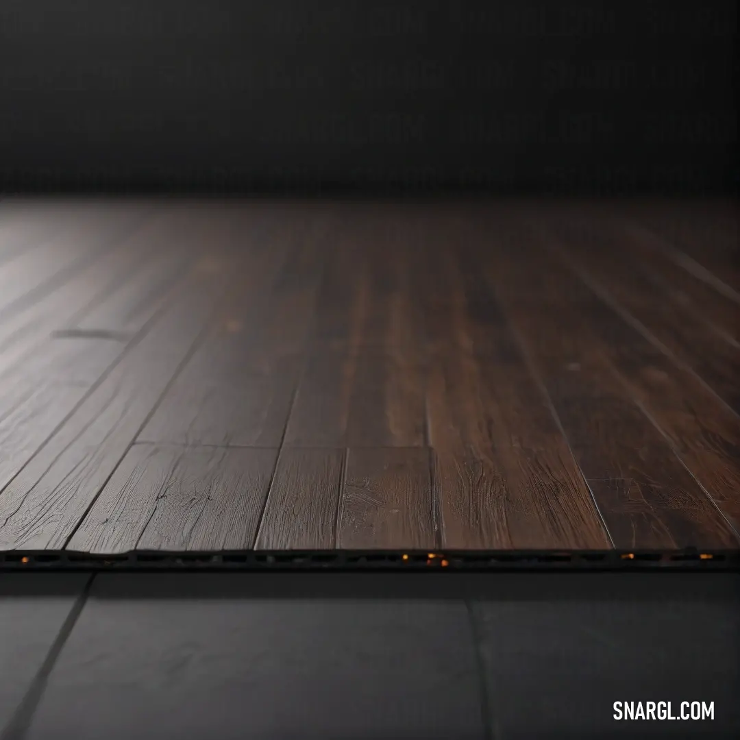 A picturesque wooden floor presented against a dramatic black background, showcasing the charming texture and warm hues of the wood. The scene invites a sense of calm and elegance, reinforcing the beauty found in simplicity.