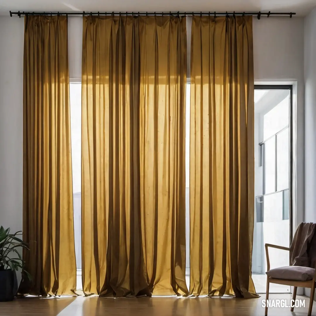 Chair in front of a window with a curtain open to let light in on it and a plant in the corner. Example of #746438 color.