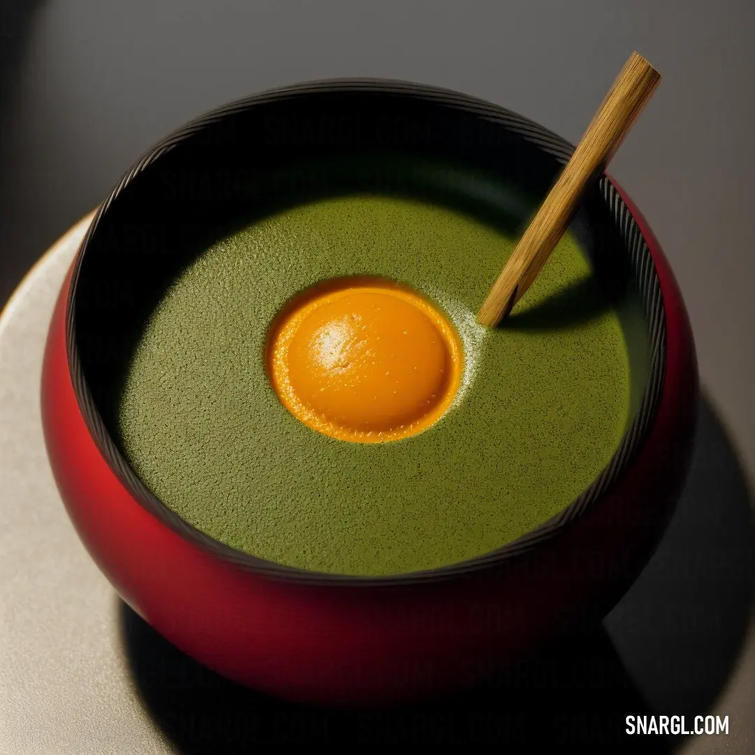 Bowl of soup with an egg in it and a wooden spoon in it on a plate with a black table. Example of RGB 116,100,56 color.