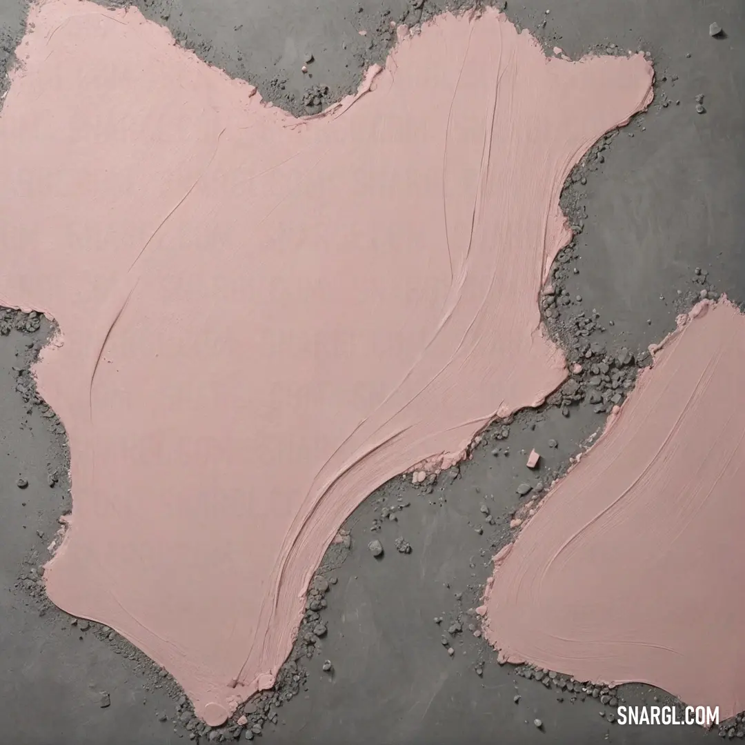 A vibrant close-up of pink paint being delicately brushed onto a textured surface, contrasting beautifully with a muted gray backdrop, highlighting the rich depth and warmth of the color.