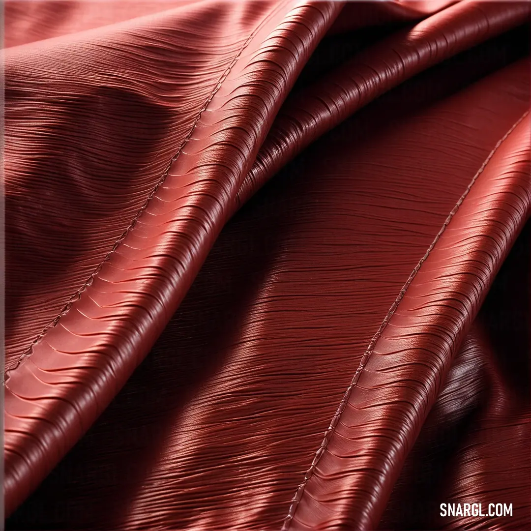 Red cloth with a wavy pattern on it's surface. Color NCS S 6030-Y90R.