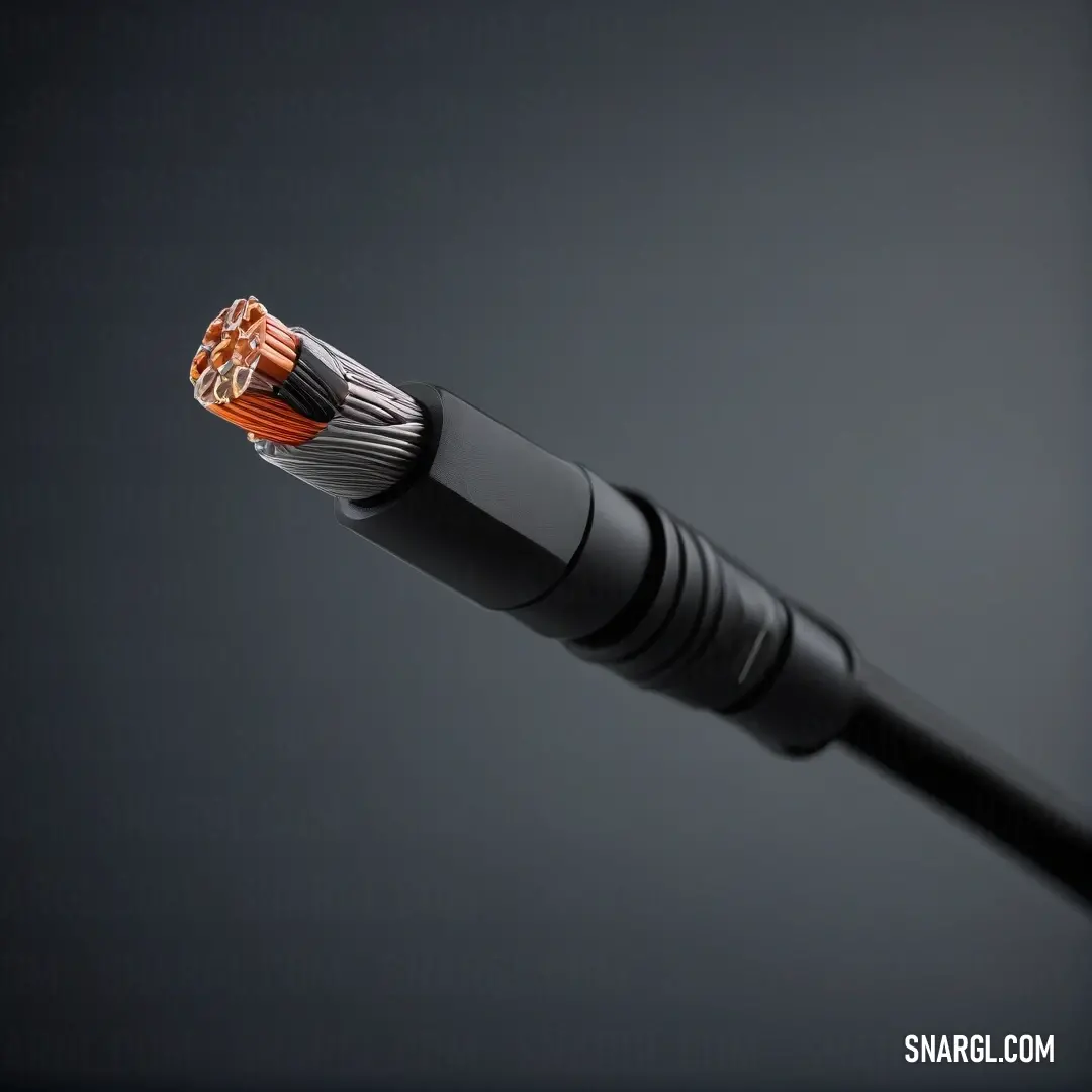 Close up of a black and orange cable. Color RGB 26,33,39.