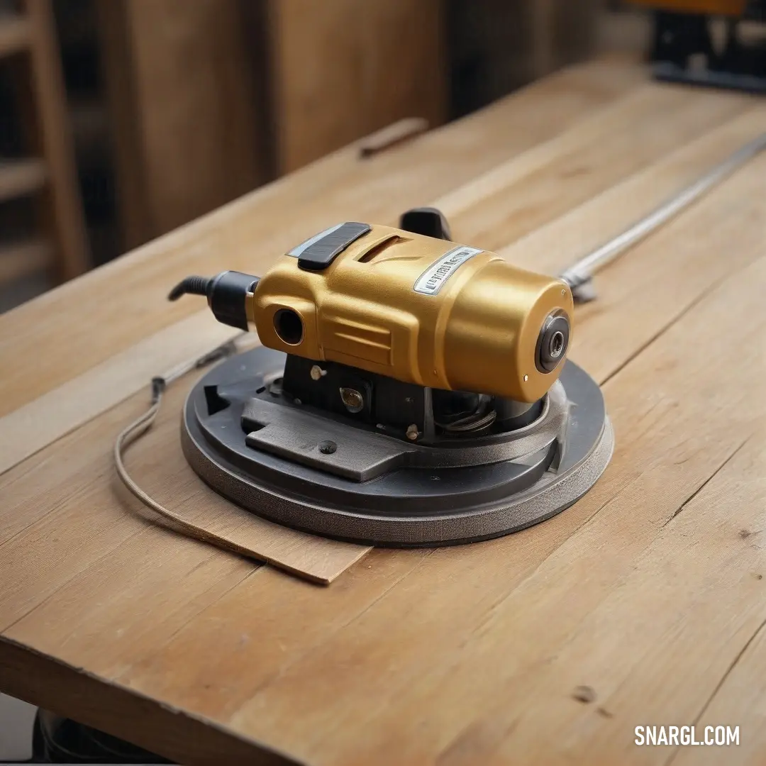 A driller rests on a table, surrounded by a wooden backdrop. The tool’s metal surface gleams under the light, reflecting the rich, warm tones of the wood, evoking a sense of craftsmanship and precision.