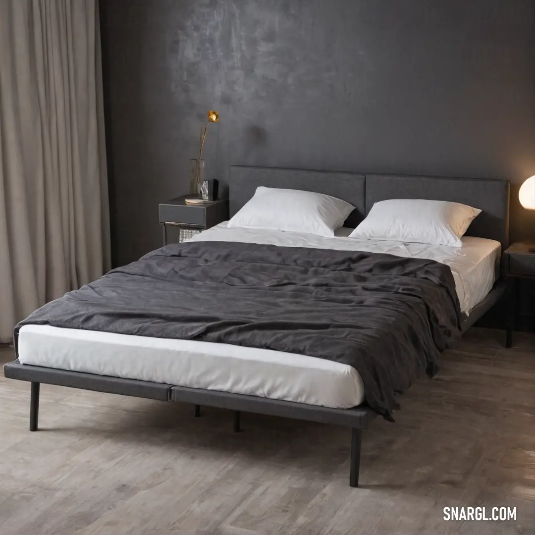 A cozy bed draped in a luxurious black blanket welcomes relaxation, flanked by elegantly designed lamps on either side. The soothing color palette of muted tones invites tranquility and comfort in a serene bedroom setting.